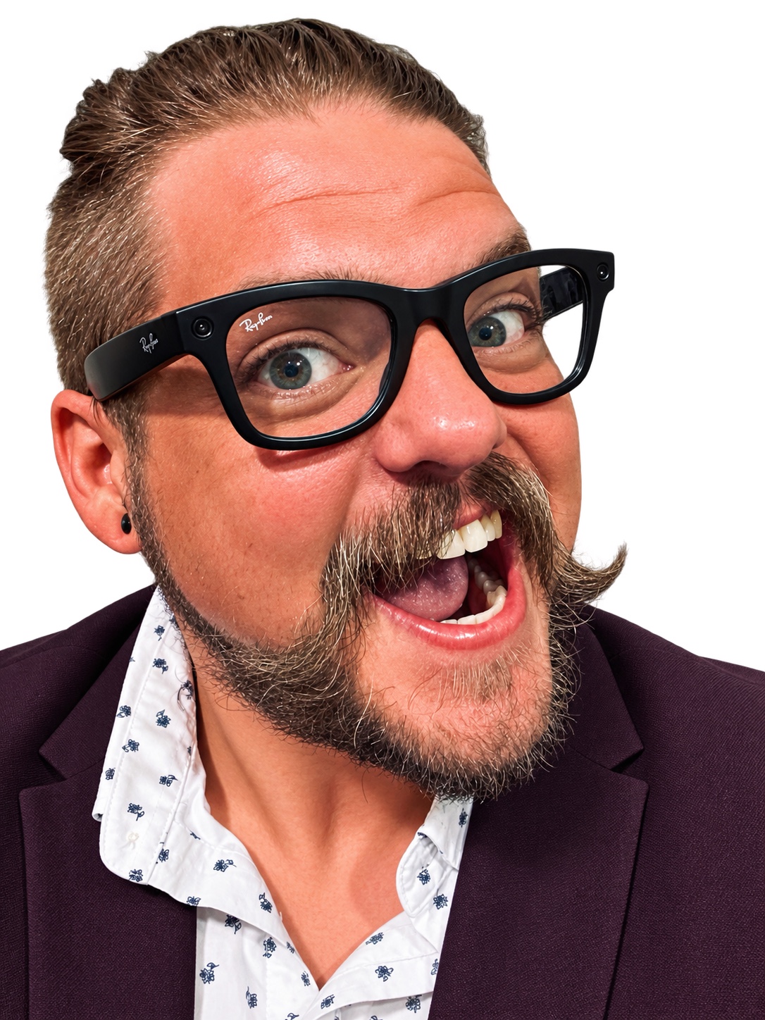 Jeff McCune wearing black glasses and a burgundy jacket, with a wide-eyed grin and curled mustache.